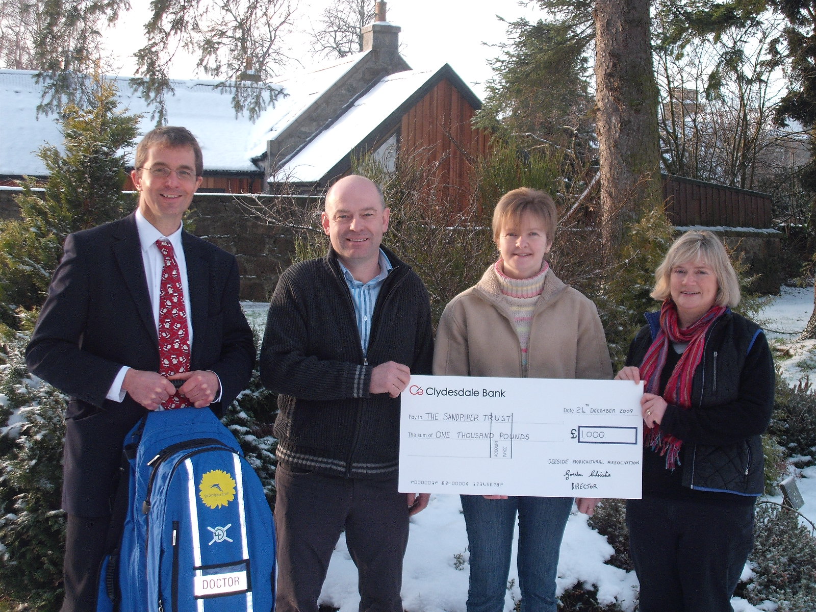 Presenting medical bag to Sandpiper Trust